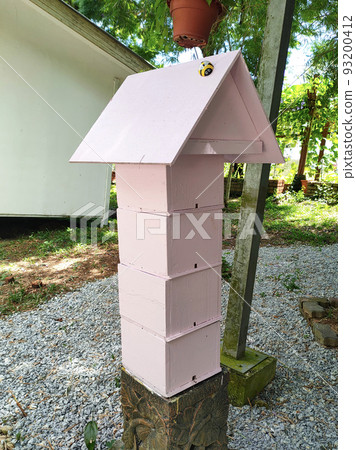 SERDANG, MALAYSIA -JUNE 7, 2022: Heterotrigona Itama or known as Stingless Bee. Man-made nests made of wood and colored colorfully to look attractive. it is farmed to get its honey. 93200412