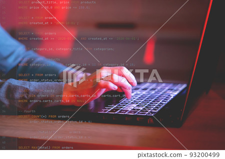 Girl works on a laptop at night, coding and creating project. Girl works on a laptop at night, coding and creating project. 93200499