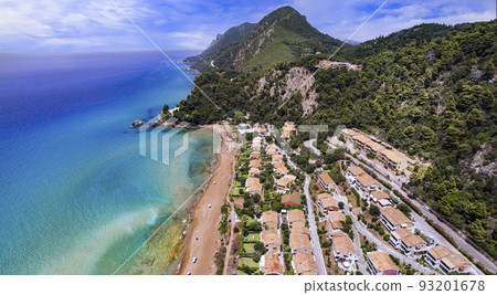 Greece summer holidays. Best scenic beaches of Corfu island - aerial panoramic view of Glyfada beach and village in western part 93201678