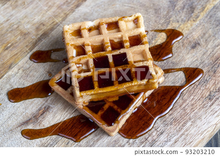 square sweet soft waffles in bee honey 93203210