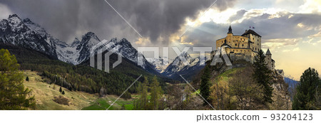 Impressive mountain scenery with amazing medieval castle Tarasp surrounded by Swiss Alps, Canton Grisons or Graubuendon, Switzerland Impressive mountain scenery with amazing medieval castle Tarasp surrounded by Swiss Alps, Canton Grisons or Graubuendon, Switzerland 93204123