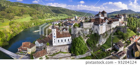 Switzerland travel and landmarks. Aarburg aerial view. old medieval town with impressive castle and cathedral over rock. Canton Aargau, Bern provinc Switzerland travel and landmarks. Aarburg aerial view. old medieval town with impressive castle and cathedral over rock. Canton Aargau, Bern provinc 93204124
