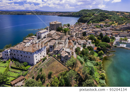 Scenic lakes of Italy - beautiful Bolsena. aerial view of Capodimonte medieval village. Viterbo province, Lazio region 93204134