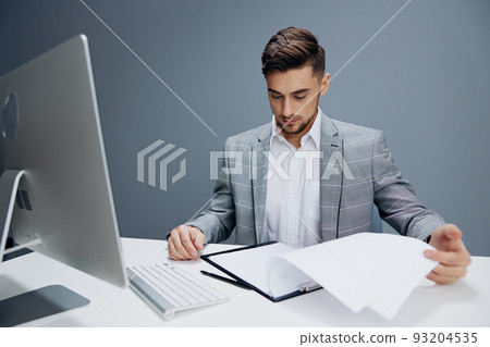 businessmen working at the computer in the office executive 93204535