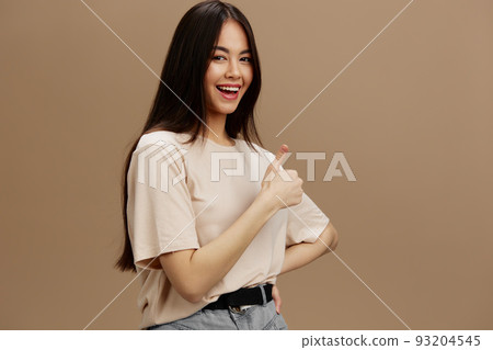 young woman t-shirt posing modern styles cosmetics beige background young woman t-shirt posing modern styles cosmetics beige background 93204545
