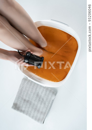 procedure of ionic detox foot bath machine in spa beauty center isolated procedure of ionic detox foot bath machine in spa beauty center isolated 93206046