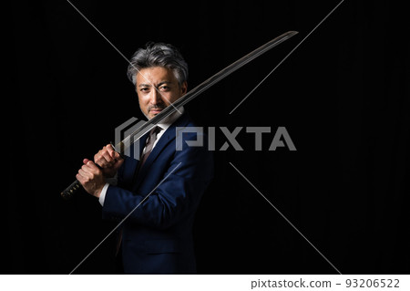 A man with a Japanese sword Black background 93206522