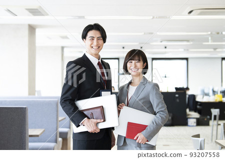 Business men and women looking at the camera smiling portrait 93207558
