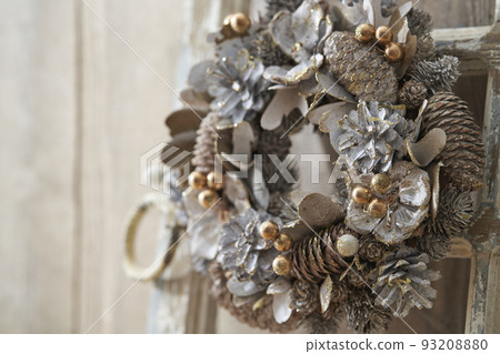 Christmas wreath decorated in an antique room 93208880