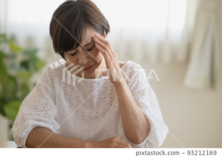 Worried Mrs. woman, headache, thinking Japanese woman image Worried Mrs. woman, headache, thinking Japanese woman image 93212169