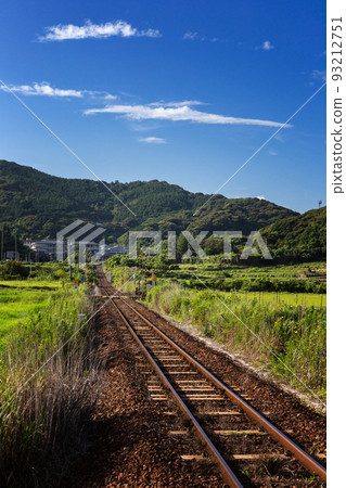 Scenery of Hongo railroad crossing and rice terraces on the San'in Main Line, Toyoura-cho, Shimonoseki City, Yamaguchi Prefecture 93212751
