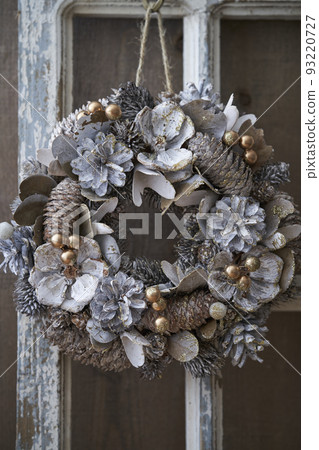 Christmas wreath decorated in an antique room 93220727