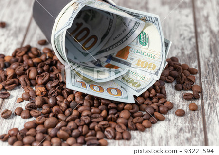 Concept : generous tip for a cup of morning coffee Concept : generous tip for a cup of morning coffee 93221594