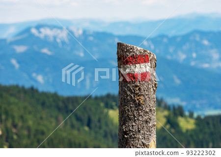 Red and White Trail Sign on a Tree Trunk - Alps Austria Europe Red and White Trail Sign on a Tree Trunk - Alps Austria Europe 93222302