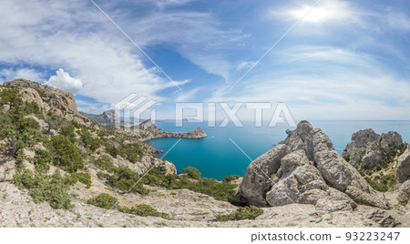 Beautiful seascape, panorama of cape Kapchik to the Galitsin Trail and blue bay of the Black Sea. Sudak, New World. Landscape of the sea coast. The concept of calmness, silence and unity with nature. Beautiful seascape, panorama of cape Kapchik to the Galitsin Trail and blue bay of the Black Sea. Sudak, New World. Landscape of the sea coast. The concept of calmness, silence and unity with nature. 93223247