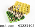 quail eggs in the package on white background 93223402