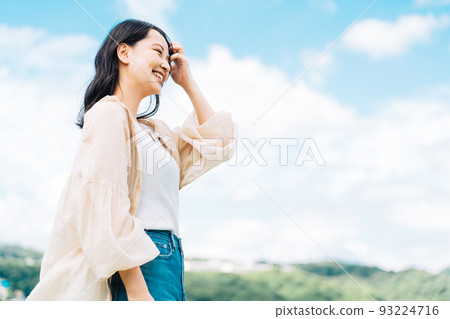 Women and blue sky 93224716