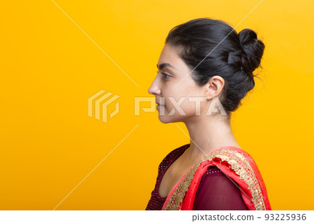 Portrait of young adult indian woman in sari. Portrait of young adult indian woman in sari. 93225936
