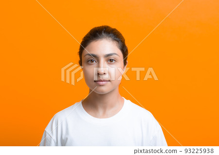 Portrait of young adult indian woman in T-shirt 93225938