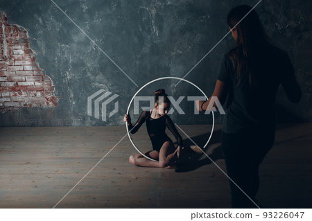 Young girl professional gymnast woman dance rhythmic gymnastics with ribbon at studio. 93226047