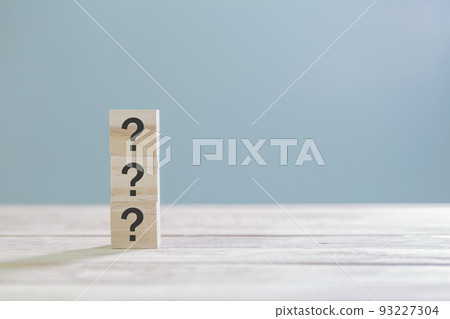 Wooden cube block with sign question mark symbol on wood table with with copy space Wooden cube block with sign question mark symbol on wood table with with copy space 93227304