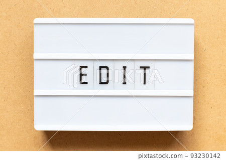 Lightbox with word edit on wood background 93230142