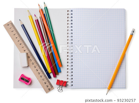School notebook with colored pencils and a ruler on a white background. Top view. Place for text. School notebook with colored pencils and a ruler on a white background. Top view. Place for text. 93230257