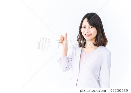 Career woman giving a good sign with a smile Career woman giving a good sign with a smile 93230989