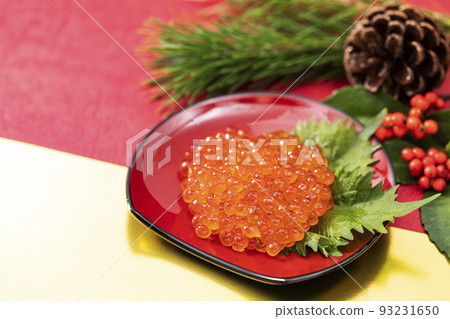 New Year dishes 10 _ how much on a red plate _ background red and gold and New Year decorations _ background large blur 93231650