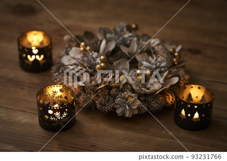 Christmas wreath illuminated by candles Christmas image 93231766