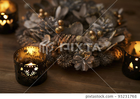 Christmas wreath illuminated by candles Christmas image 93231768