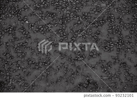 Perfect black asphalt close-up. The texture of black asphalt in England Perfect black asphalt close-up. The texture of black asphalt in England 93232101