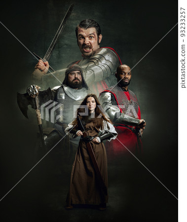 Creative art collage with brutal serious medieval warriors or knights in war clothes with swords isolated over dark vintage background. Eras comparison concept Creative art collage with brutal serious medieval warriors or knights in war clothes with swords isolated over dark vintage background. Eras comparison concept 93233257