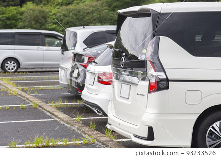 Weedy parking lot 93233526