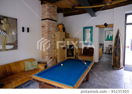German house and pool table 93235303