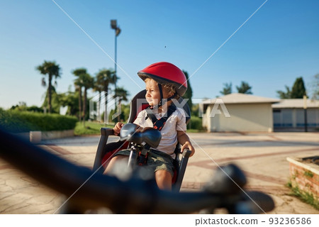cute little boy with big bike outdoors in city street cute little boy with big bike outdoors in city street 93236586
