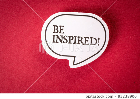 Be inspired. Speech bubble with text on red background 93238906