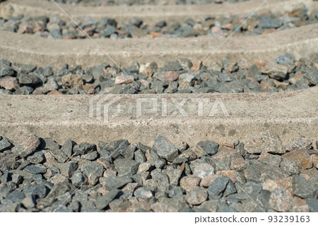 sleepers on rails and gray pebbles between them sleepers on rails and gray pebbles between them 93239163