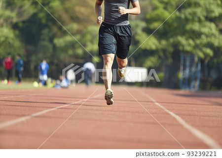 young asian man male athlete running training exercising on track young asian man male athlete running training exercising on track 93239221