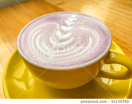 beautiful cup of Taiwanese taro milk drink with latte art in the wooden space background 93239768