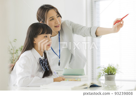 Female students taking classes at cram school Junior high school high school students 93239808