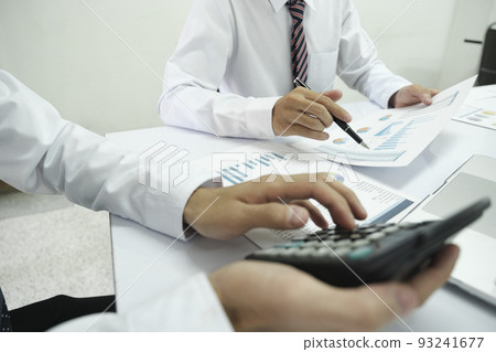 Asisan businessman teamwork meeting and discussing the investment data and report graph. Asisan businessman teamwork meeting and discussing the investment data and report graph. 93241677