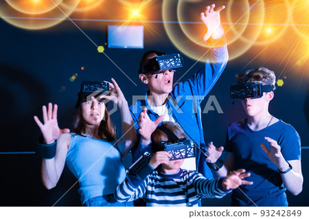 Emotional family having fun with vr headset goggles Emotional family having fun with vr headset goggles 93242849