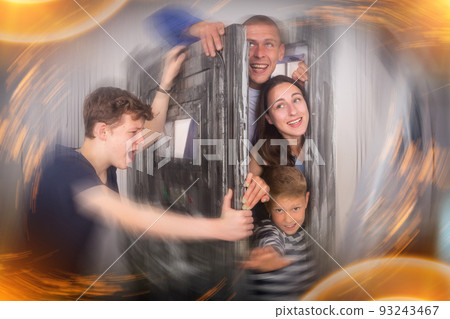 Close-knit family in solving puzzles to get out of the escape room Close-knit family in solving puzzles to get out of the escape room 93243467