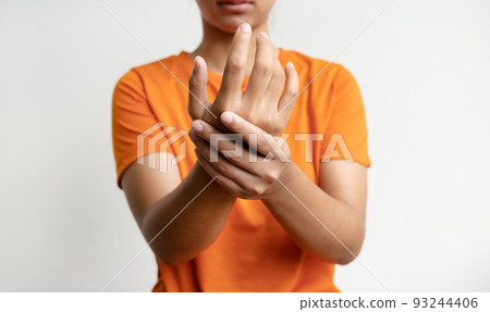 Woman hand massage physiotherapy other side is sore and numb, exhausted, tingling. Guillain-Barre Syndrome, a side effect of the Covid-19 vaccination 93244406