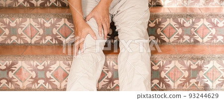 Man hand massage physiotherapy leg is sore and numb, exhausted, tingling. 93244629