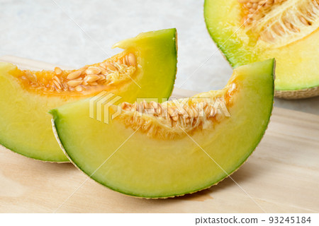 Sweet and delicious muskmelons Beautifully meshed melons are used as gifts 93245184