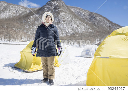 Young woman walking around the snail tent Smelt fishing image Young woman walking around the snail tent Smelt fishing image 93245937