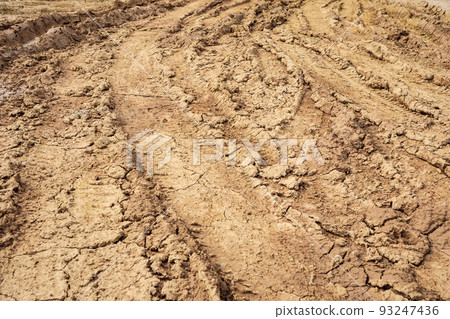 wheel tracks on rural dirt road wheel tracks on rural dirt road 93247436