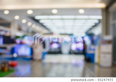 Television Smart TVs 4K Ultra HD display on shelves in eletronic department store blur background 93247455